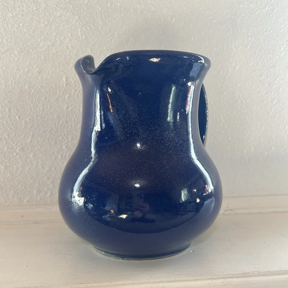 Handmade pottery pitcher blue glaze with handle